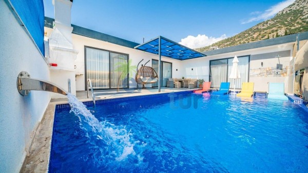 Kalkan Akbel Mevkiinde 4 Kişilik Korunaklı Tatil Villası